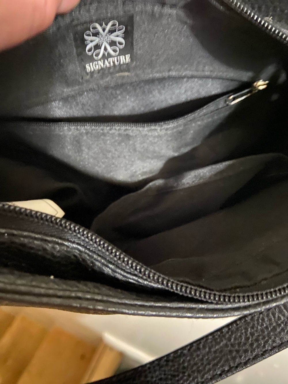 Signature Black Leather Shoulder Bag with Interior Zip Pocket